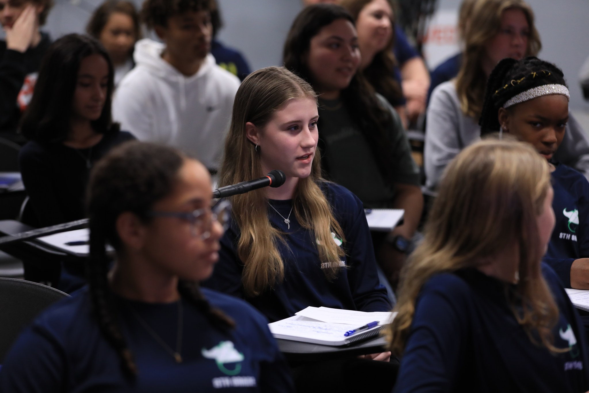 A student asks a question following an Artemis I student media briefing at NASA's Kennedy Space Center in Florida.