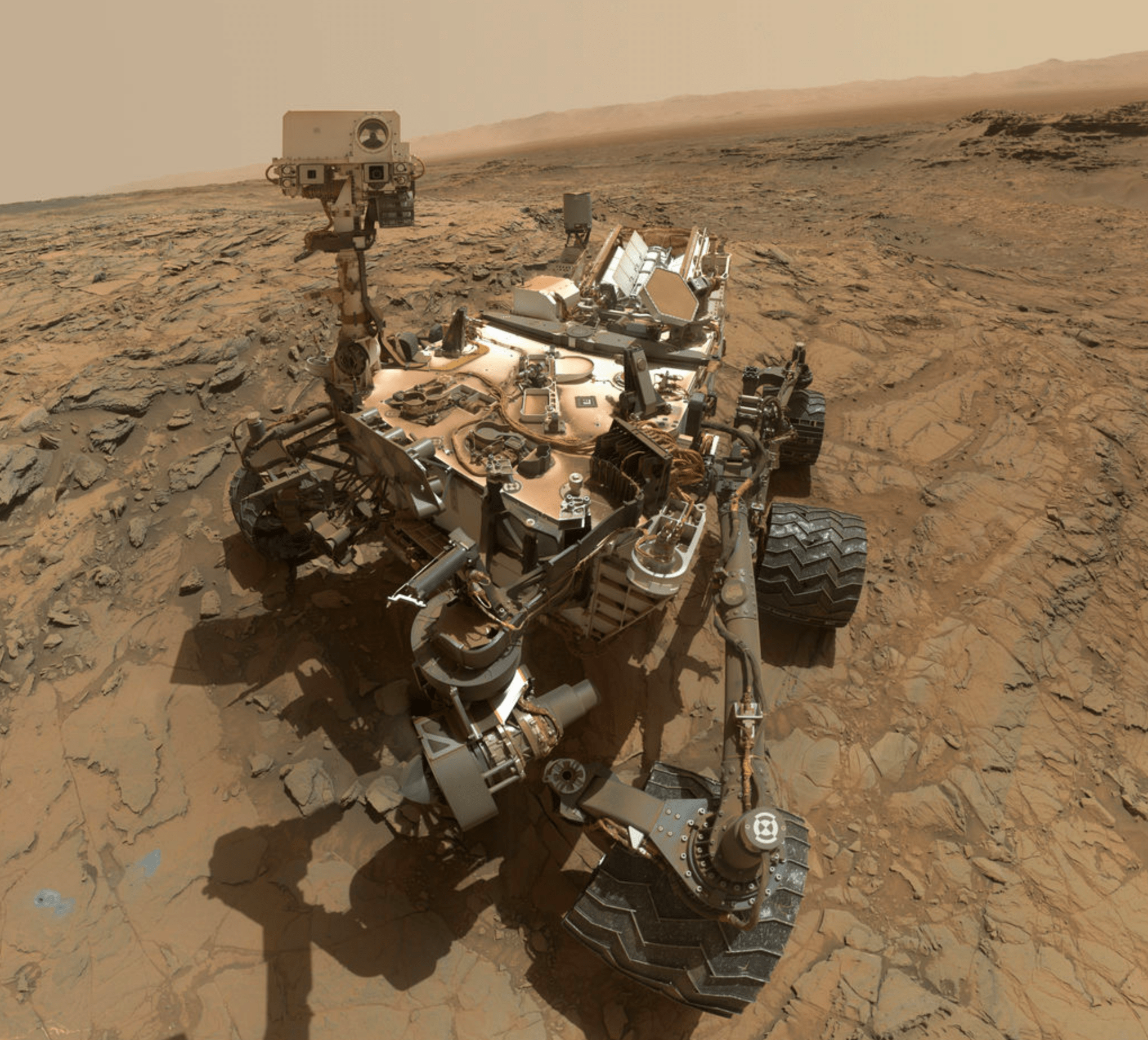 A photograph of the Curiosity rover on the surface of Mars.