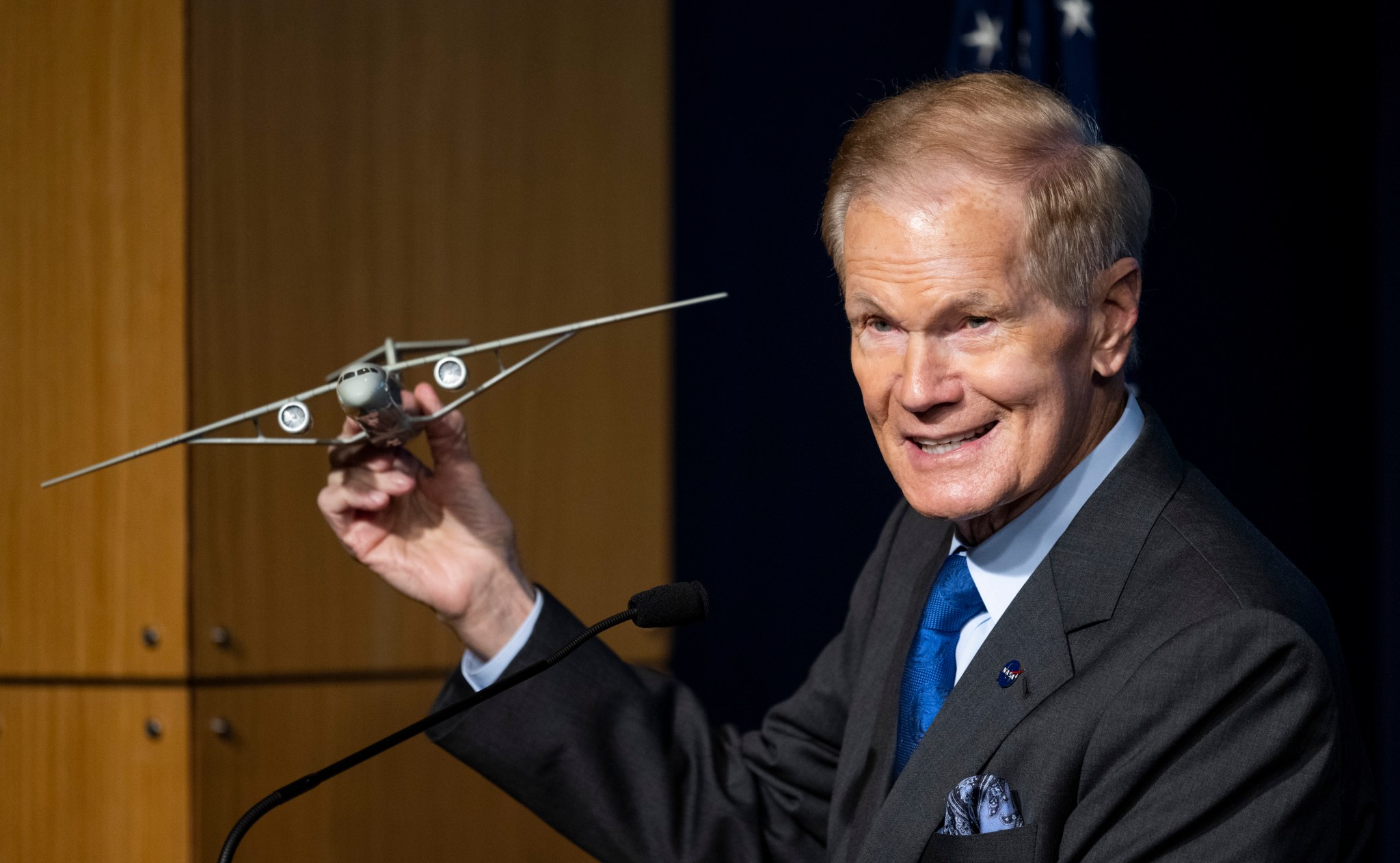 NASA Administrator Bill Nelson holds a model of an aircraft with a Transonic Truss-Braced Wing during a news conference on NASA’s Sustainable Flight Demonstrator project, Wednesday, Jan. 18, 2023, at the NASA Headquarters building in Washington, DC.