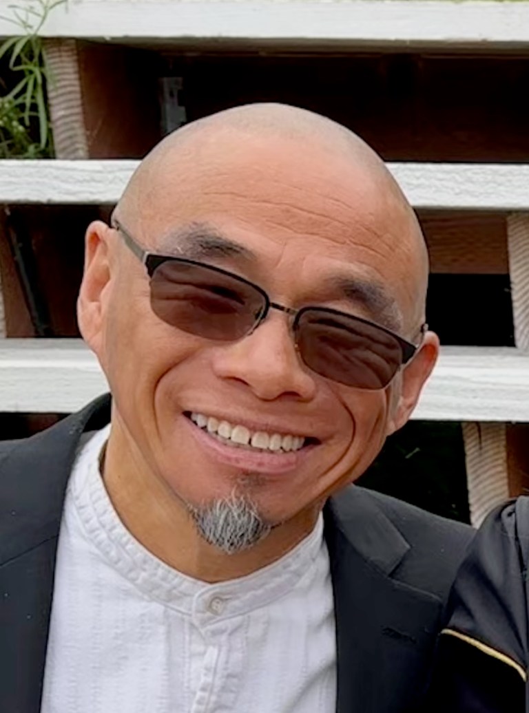 Head shot of Sidney Sun