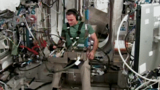 video of an astronaut working on a grip experiment