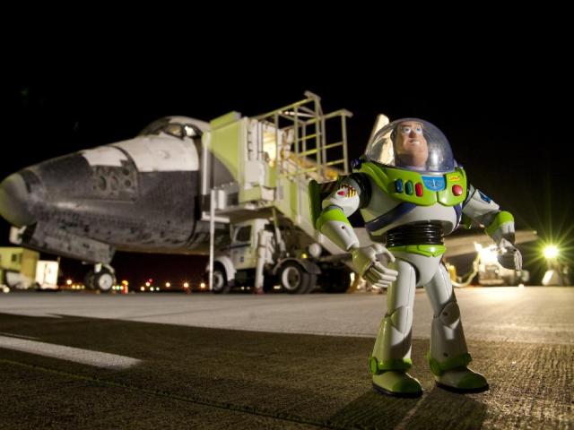 Disney's Buzz Lightyear returned home on space shuttle Discovery after having spent 15 months aboard the International Space Station.