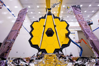 The fully assembled James Webb Space Telescope with its sunshield and unitized pallet structures