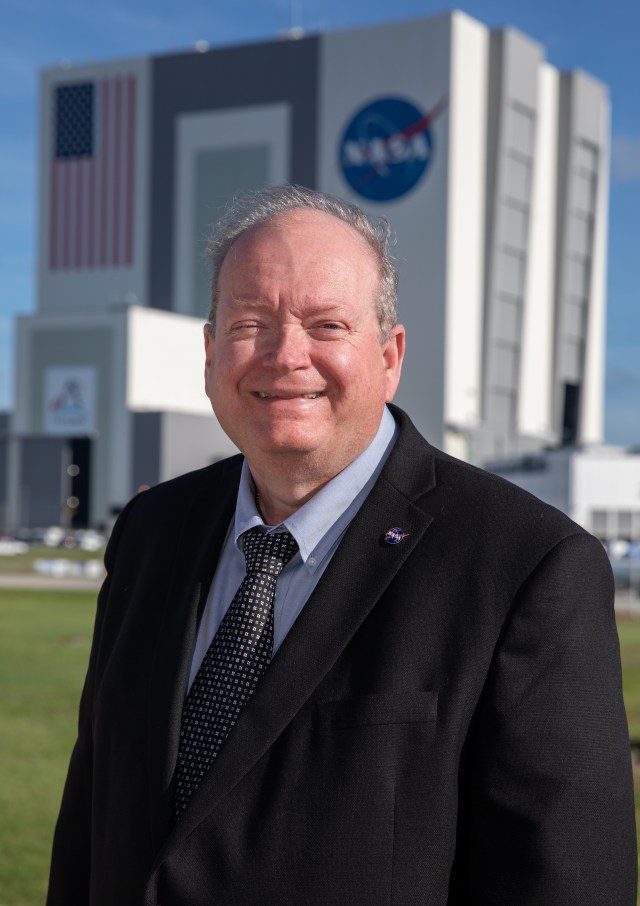 A portrait of Burt Summerfield, associate director of management at NASA's Kennedy Space Center.
