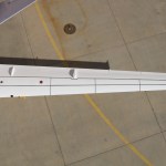 Top view of an aircraft wing with fiber optic sensors attached.