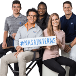 A photo of a group of students holding a NASA Interns sign.