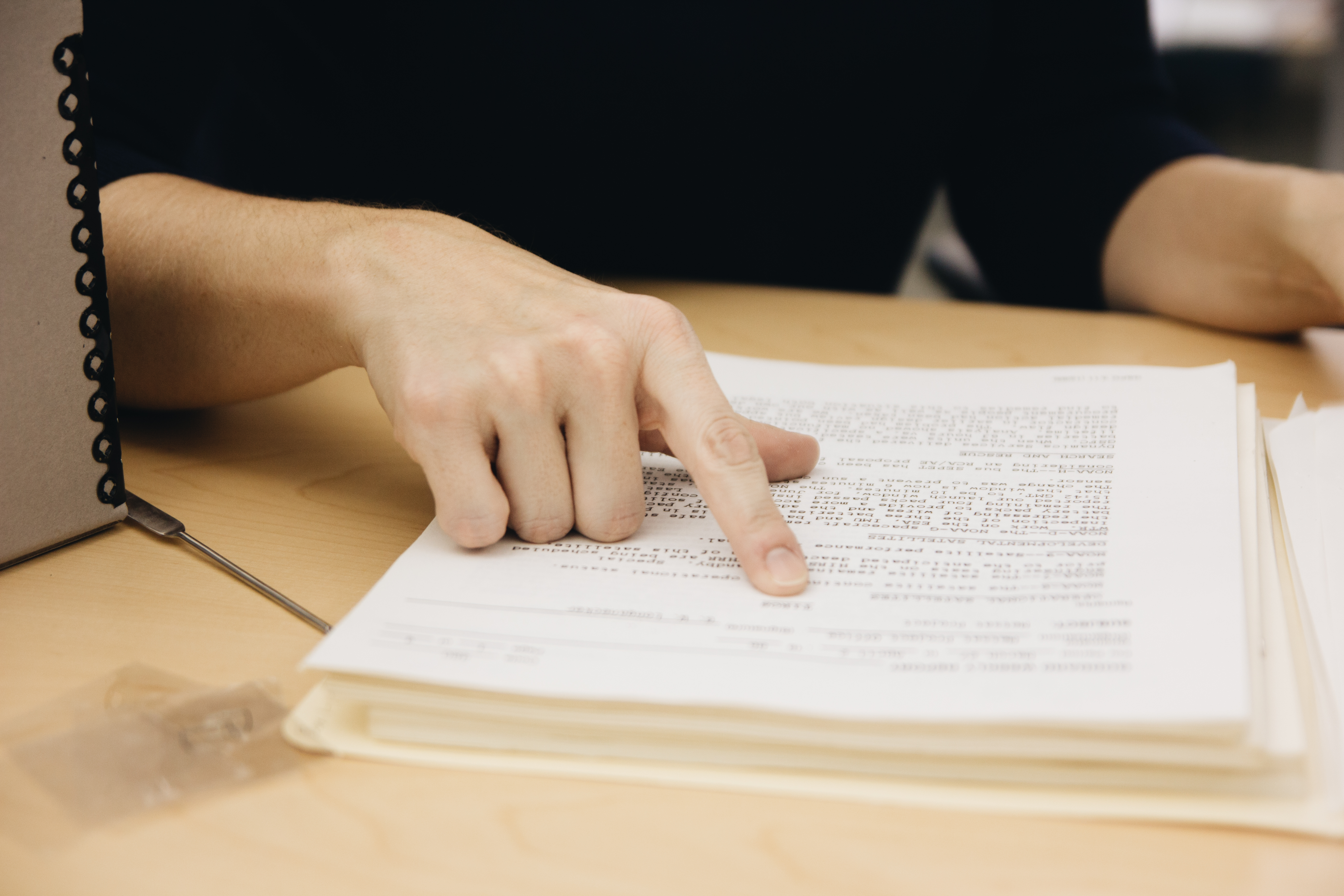 A NASA Archivist helps a researcher