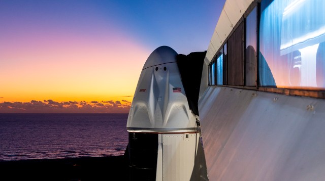In view here is a closeup of SpaceX’s Dragon Endurance spacecraft, sitting atop the company’s Falcon 9 rocket, at NASA’s Kennedy Space Center Launch Complex 39A in Florida on Oct. 1, 2022, as the Sun begins to rise.