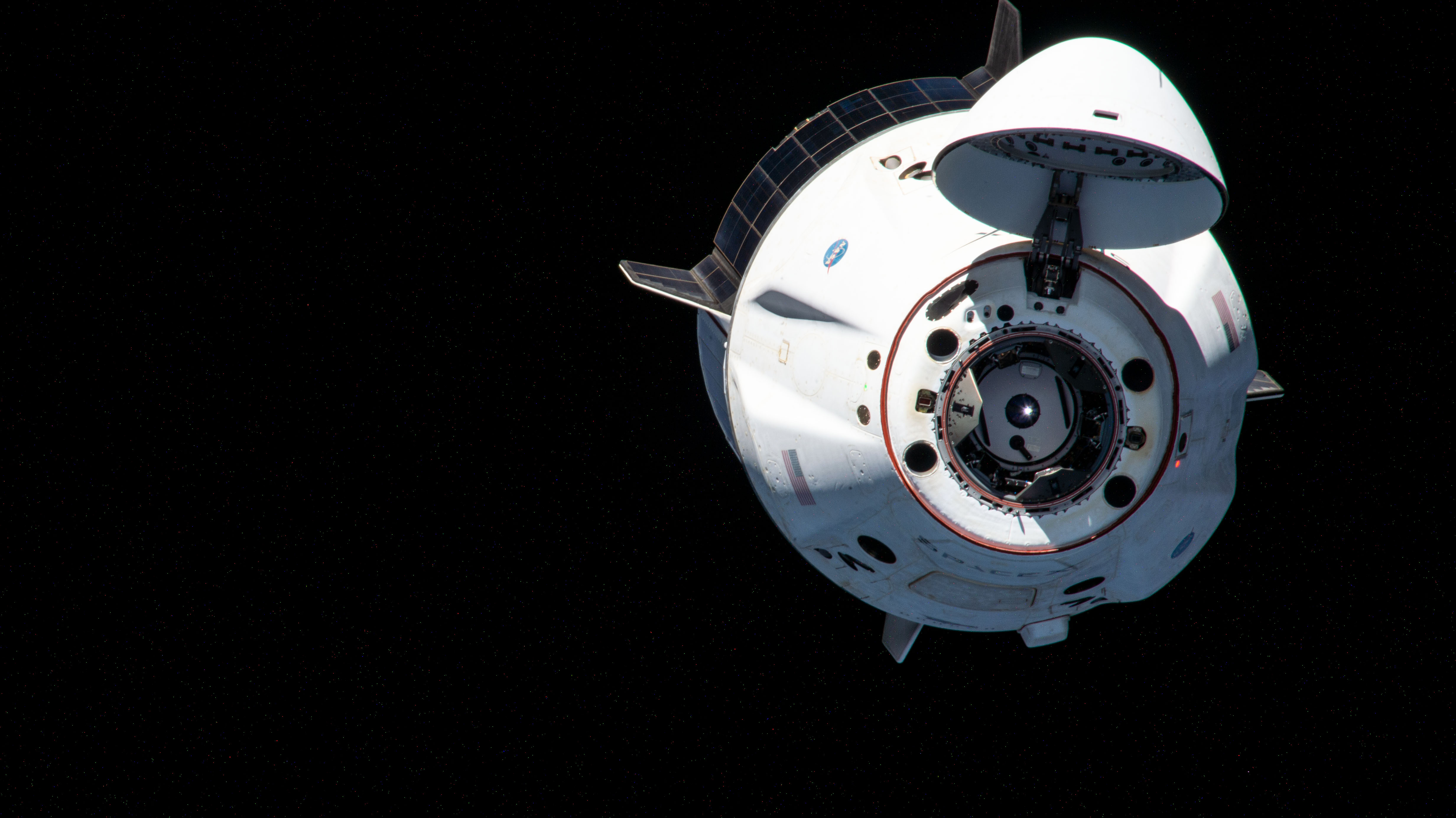 The SpaceX Crew Dragon Endeavour carrying four commercial crew astronauts departs the International Space Station.