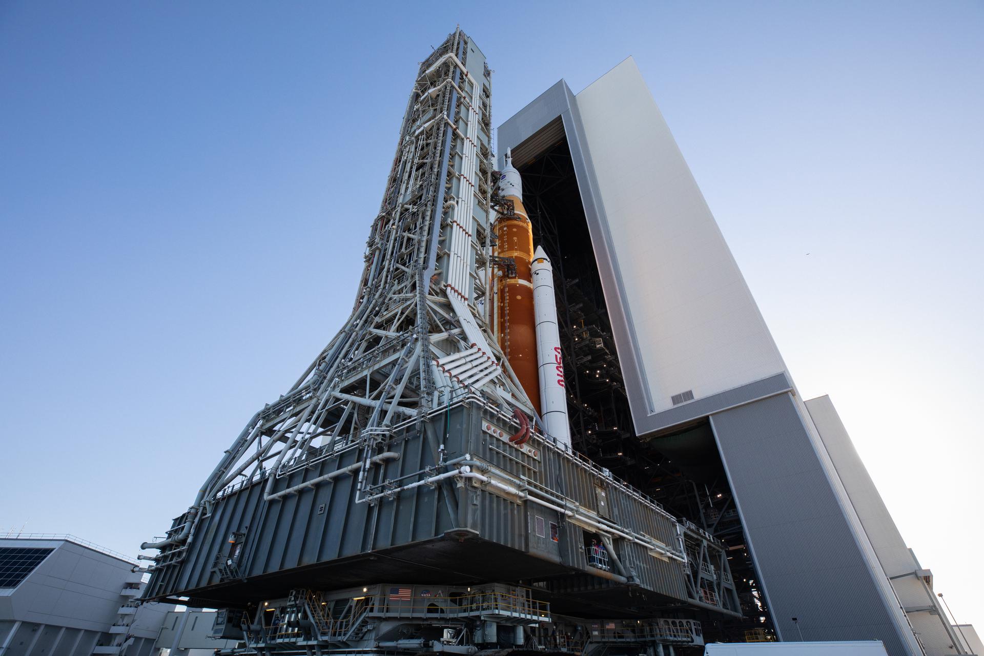 NASA’s Space Launch System rocket, with the Orion capsule atop, slowly rolls out of the Vehicle Assembly Building at the agency’s Kennedy Space Center in Florida on March 17, 2022, on its journey to Launch Complex 39B.