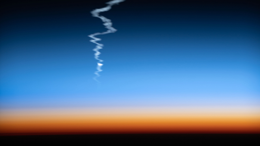 The Soyuz MS-22 crew ship was photographed from the space station ascending into orbit with three crew members during a sunset 263 miles above Asia.