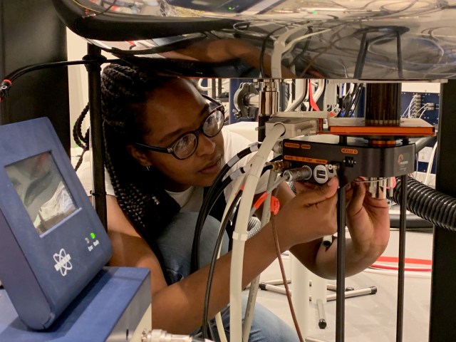 CCNY Chemical Engineering Ph.D. student Loleth Robinson performs solid-state NMR measurements on NASA JPL battery materials for the future Europa Lander.