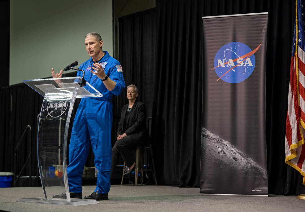 Astronaut Michael Hopkins provides opening remarks during the first in-person Silver Snoopy Awards ceremony since 2019. 