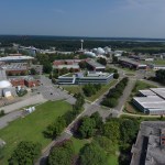 This is an aerial photograph of NASA Langley Research Center. Langley's Hypersonic Facilities Complex, comprised of four large vacuum spheres, can be seen in the background.