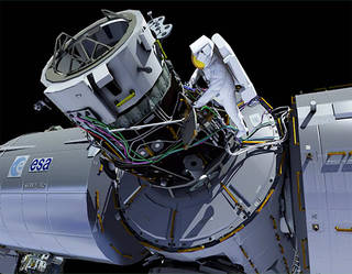 This computer rendering depicts an astronaut from the International Space Station performing a spacewalk to install the International Docking Adapter