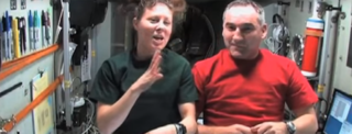 Astronaut Tracy Caldwell Dyson and her commander, Russian cosmonaut Alexander Skvortsov (Sasha)