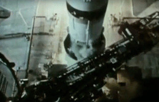 A top-down view of a Saturn rocket as it launches