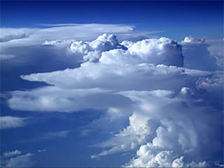 An aerial photograph of fluffy white clouds