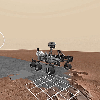 Screenshot from the Access Mars virtual reality experience showing the Curiosity rover on the surface of Mars