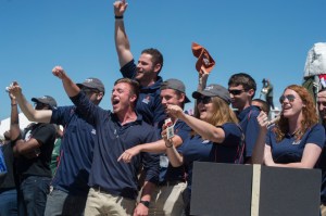 Student Launch team celebrates their rocket launching.