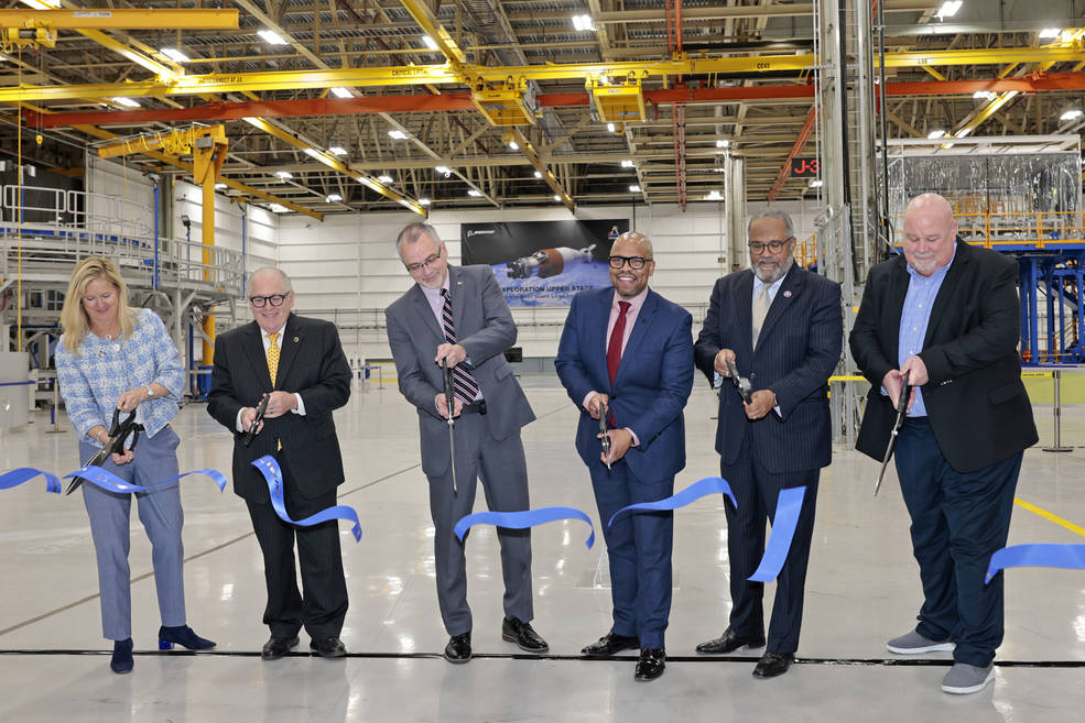 Kay Sears, Don Pierson, Jim Free, Ted Colbert, Troy Carter and John Honeycutt cut the ribbon at the Exploration Upper Stage Gray Box ribbon-cutting ceremony at NASA’s Michoud Assembly Facility Feb. 13. 