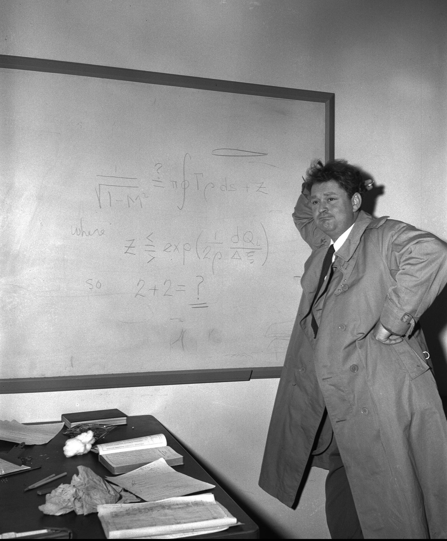 H. Julian Allen standing at a blackboard at Ames Research Center, Apr. 08 1968.