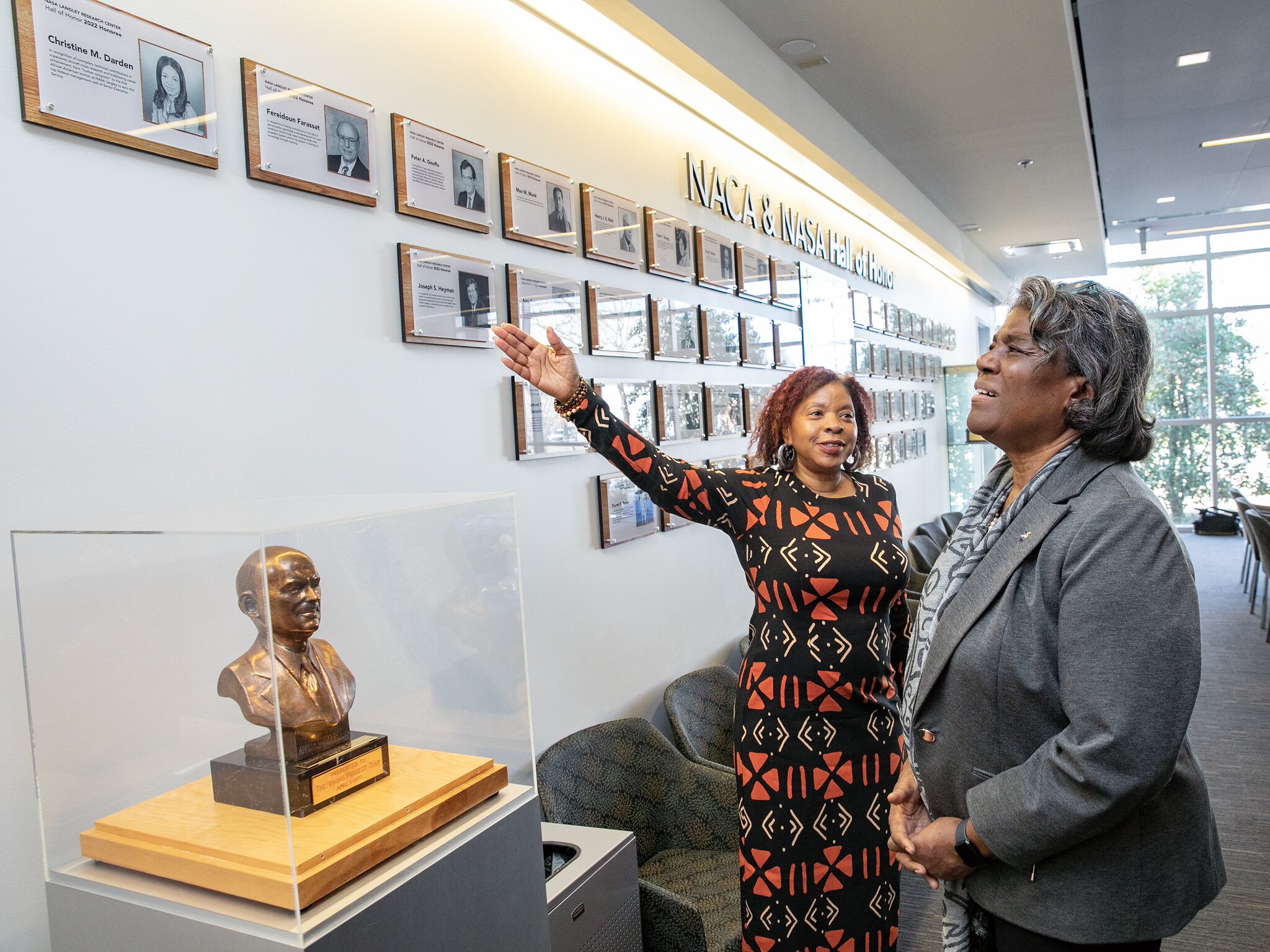 Langley Chief Technologist Julie Williams-Byrd, left, talks to US Ambassador to the United Nations Linda Thomas-Greenfield about some of the center's historic figures, celebrated in Langley's Hall of Honor.
