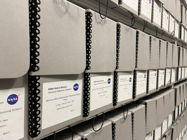 Archival boxes on shelves