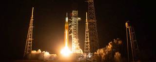 The SLS rocket launches during the Artemis 1 mission. 