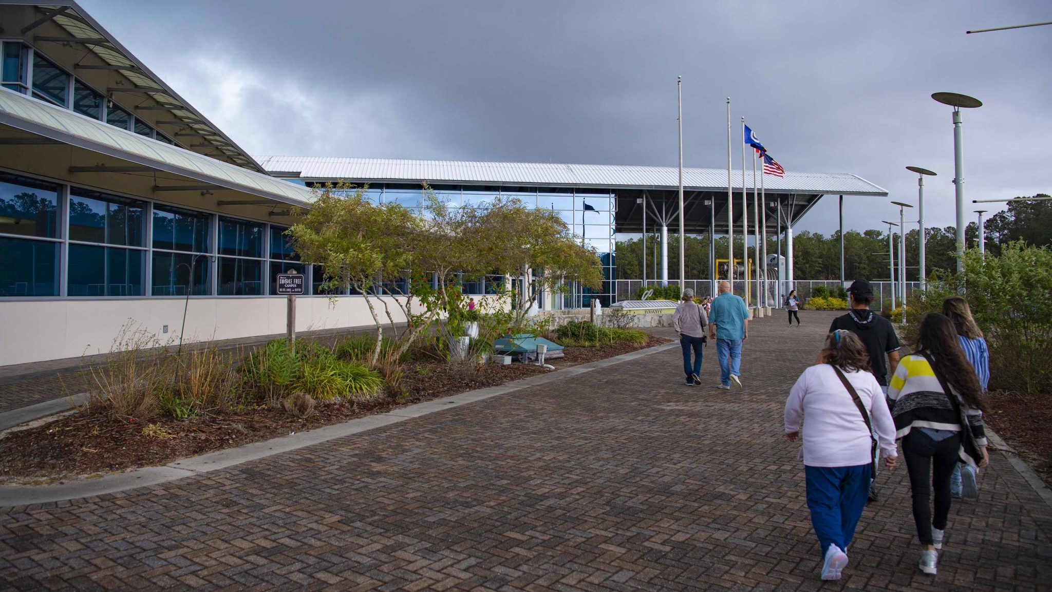 paved walkway leads to entrance of the INFINITY Science Center