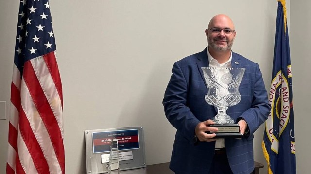 Marshall Space Flight Center Deputy Director Joseph Pelfrey holds the NASA Small Business Administrator’s Cup Award. Marshall has won the Cup seven times