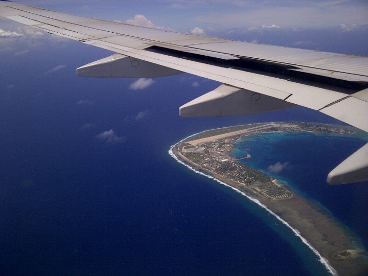 Orbital Science Corp.'s L-1011 aircraft "Stargazer" flies over the runway on Kwajalein Atoll.