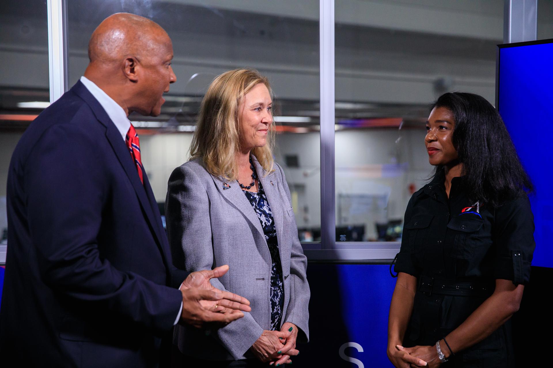 Jasmine Hopkins, NASA Communications, speaks with Kelvin Manning, deputy director, and Janet Petro, director of Kennedy Space Center.