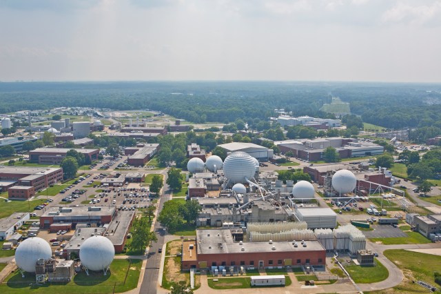 This is an aerial photo of NASA Langley Research Center. Wind tunnels and the hangar can be seen in the photo.