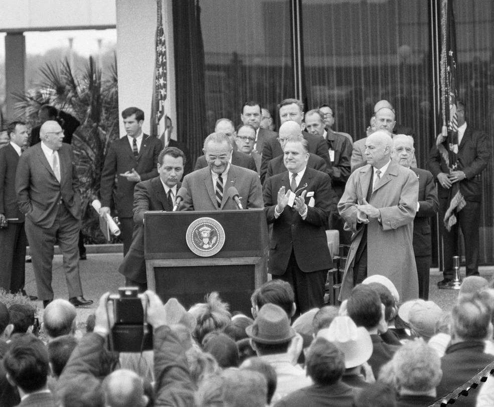 lbj_speaking_in_front_of_bldg_1_mar_1_1968