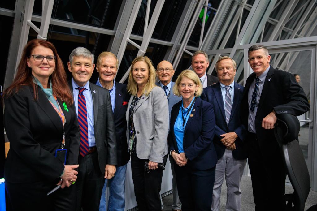 NASA dignitaries and launch team members gather after the successful launch of the agency’s Space Launch System and Orion spacecraft.