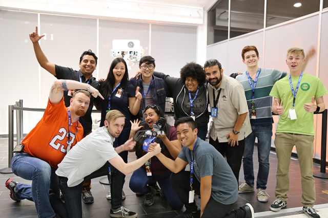 A group of NCAS students holding their rover