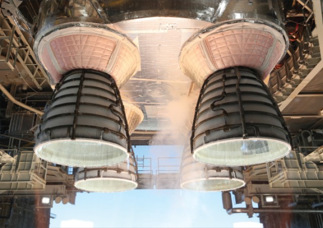 4 engines roaring during an engine test at Stennis Space Center