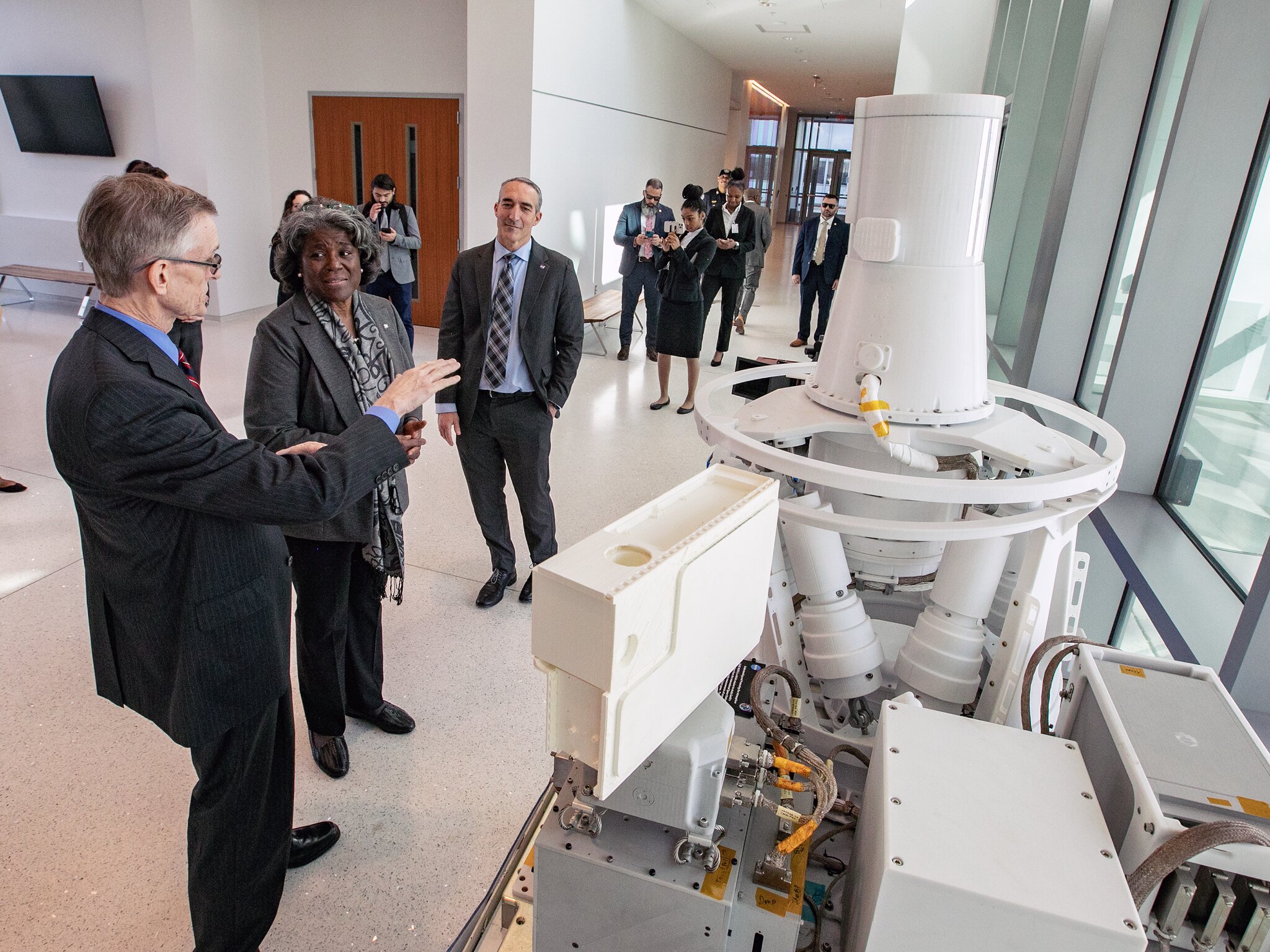 Langley Deputy Director Dave Young, left, talks to US Ambassador to the United Nations Linda Thomas-Greenfield about NASA's efforts to research Earth and its changing climate.