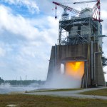 A mounted field camera offers a close-up views as NASA conducts an RS-25 hot fire test on the Fred Haise Test Stand.