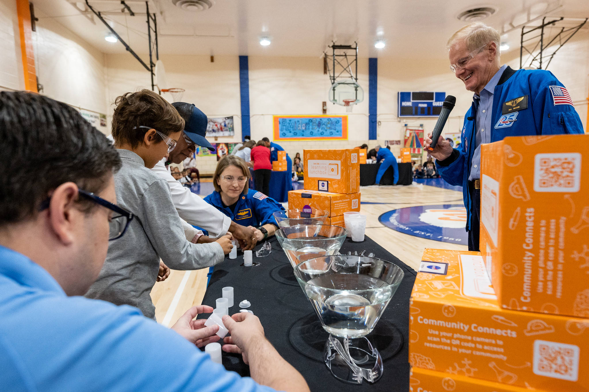 During this informal event, NASA's Administrator is demonstrating a science experiment