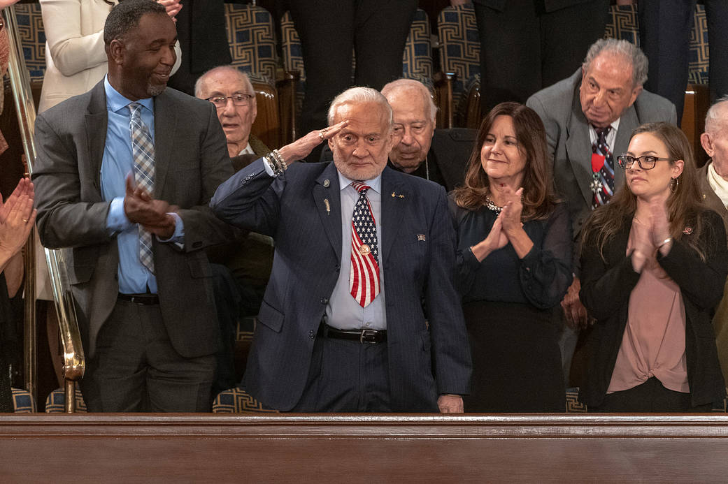 Astronaut Buzz Aldrin salutes after being introduced at the 2019 State of the Union address.