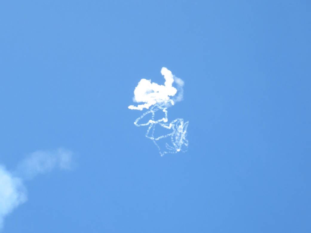 Vapors from the second stage of the RockOn sounding rocket create unusual patterns in the sky.