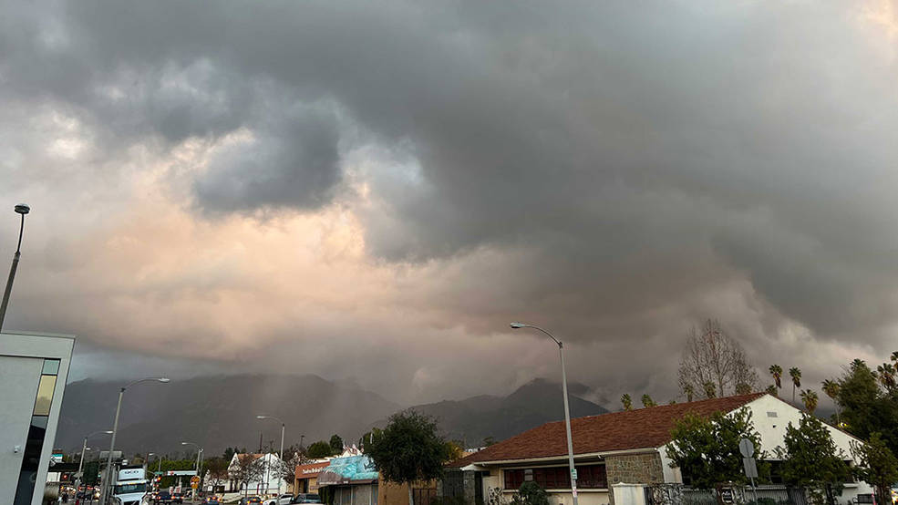 Dark clouds roil the sky above Pasadena, California