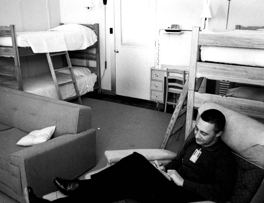 Gus Grisson relaxes in crew quarters