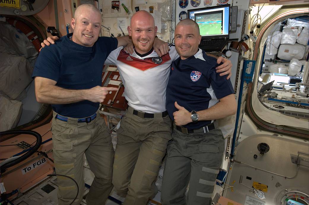NASA astronut Steve Swanson, ESA astronaut Alexander Gerst and NASA astronaut Reid Wiseman after the U.S./Germany match at the 2