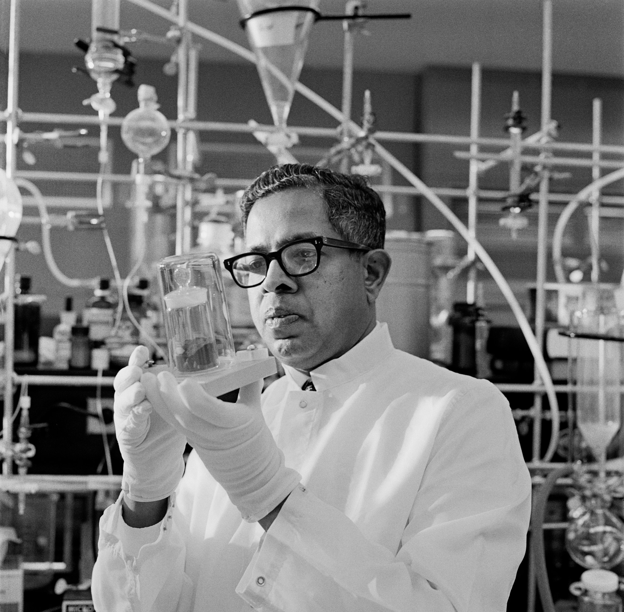 Photograph of Dr. Cyril A. Ponnamperuma in the Lunar Chemical Laboratory at Ames