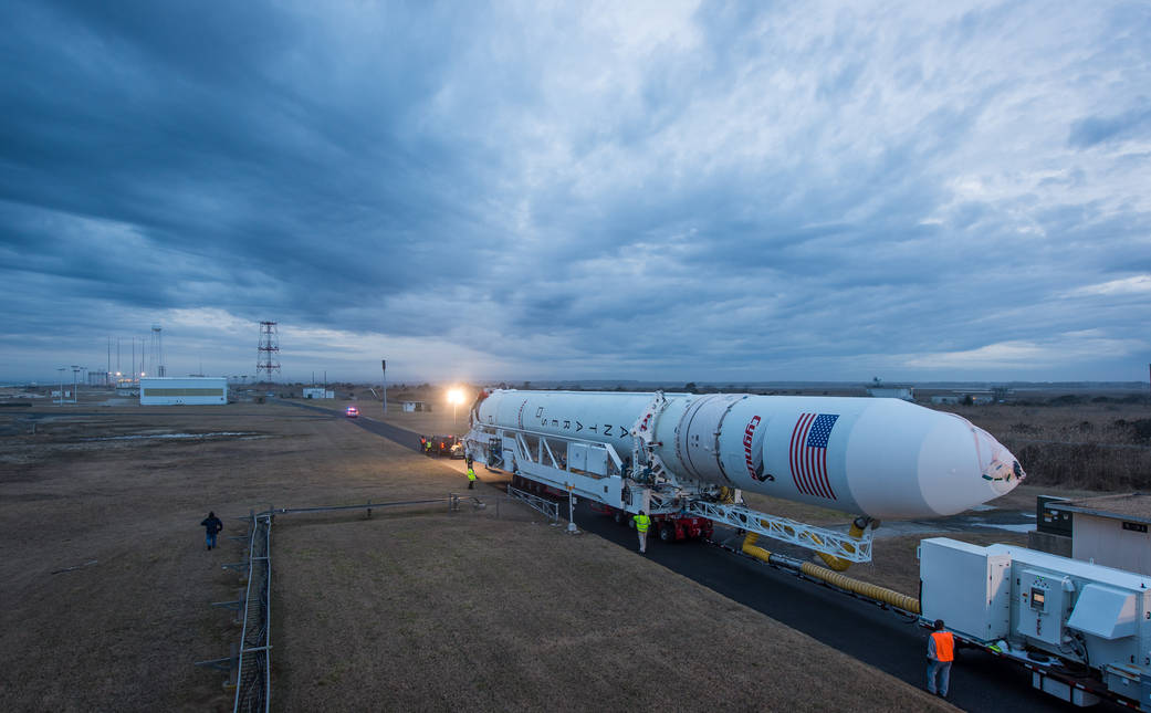 An Orbital Sciences Corporation Antares rocket is seen as it is rolled out to Launch Pad-0A at NASA's Wallops Flight Facility, S