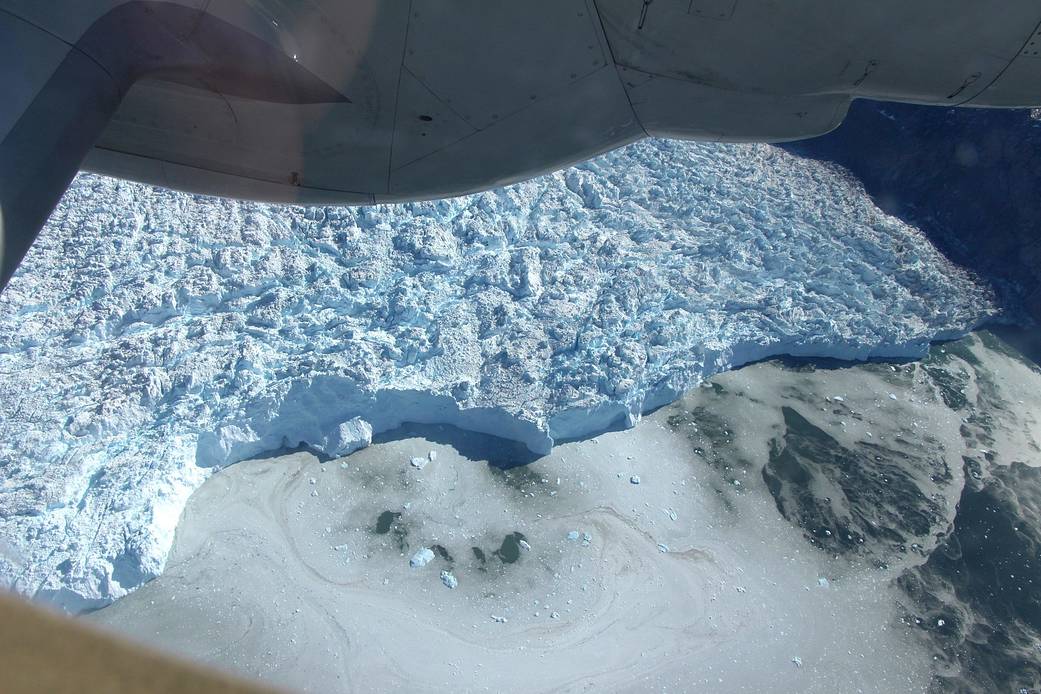 Overhead view of glacier front photographed from aircraft