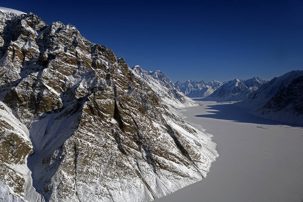 View of the frozen fjord downstream of Violingletscher (Violin Glacier) in Østgrønland (East Greenland) seen during an Operati